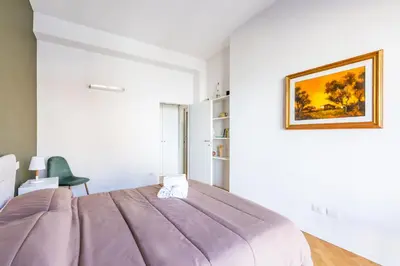 Letto o letti in una camera di Chiaia Mon Amour Elegant Flat by Napoliapartments
