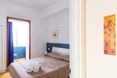 Letto o letti in una camera di Chiaia Mon Amour Elegant Flat by Napoliapartments