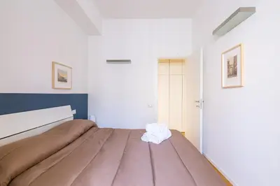 Letto o letti in una camera di Chiaia Mon Amour Elegant Flat by Napoliapartments