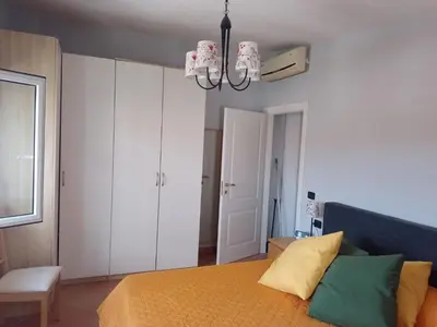 Letto o letti in una camera di Uno sguardo sui tetti