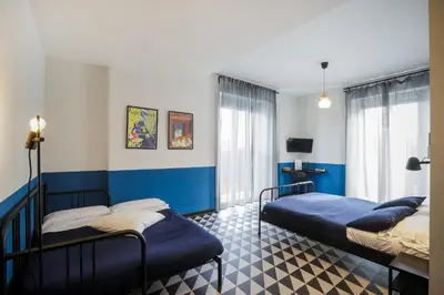 Letto o letti in una camera di Nuccia Urban Loft