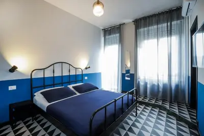 Letto o letti in una camera di Nuccia Urban Loft