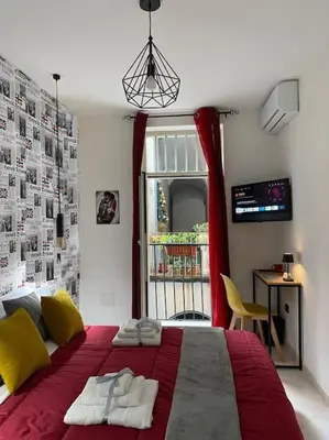 Letto o letti in una camera di Pontecorvo Naples Apartament