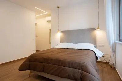 Letto o letti in una camera di TOLEDO3