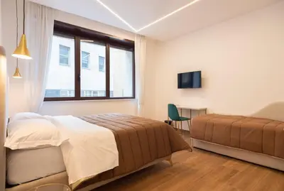 Letto o letti in una camera di TOLEDO3