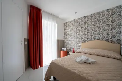 Letto o letti in una camera di P.C. Boutique H. LifeStyle, Napoli Centro, by ClaPa Group Dislocated Hospitality