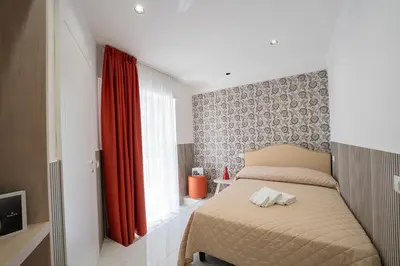 Letto o letti in una camera di P.C. Boutique H. LifeStyle, Napoli Centro, by ClaPa Group Dislocated Hospitality