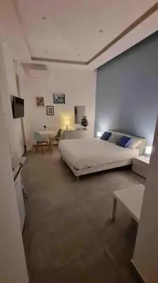 Letto o letti in una camera di DaDedo’ -Monolocale tra Plebiscito Toledo e Chiaia