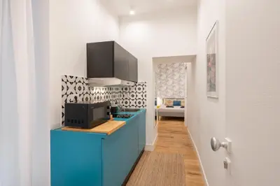 Cucina o angolo cottura di The Idyll Boutique apartment - Suite in Napoli's Spanish Quarters