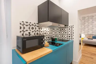 Cucina o angolo cottura di The Idyll Boutique apartment - Suite in Napoli's Spanish Quarters
