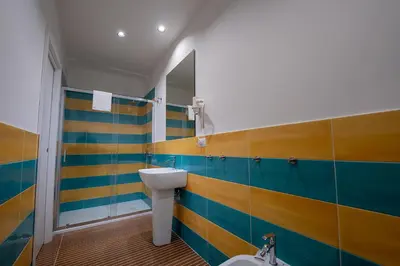 Bagno di GreRos H. Rooms Napoli Centro by Clapa Group Dislocated Hospitality