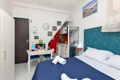 Letto o letti in una camera di Cinea Studio by Palazzo Pistorius