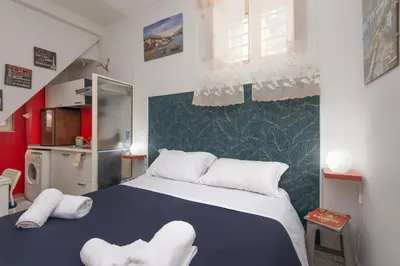 Letto o letti in una camera di Cinea Studio by Palazzo Pistorius
