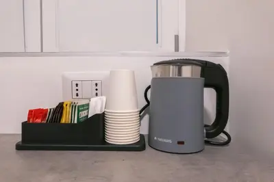 Set per la preparazione di tè e caffè presso Sleep INN Toledo - SELF CHECK-IN