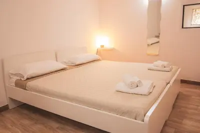 Letto o letti in una camera di Casa Masaniello - Affittacamere Guesthouse in Historical Center Toledo Station