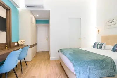 Letto o letti in una camera di Annapoli Rooms