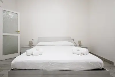 Letto o letti in una camera di Vico Mastellone 16