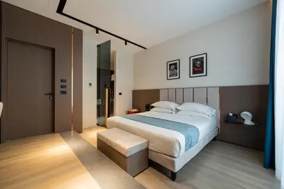Letto o letti in una camera di Agra Suites