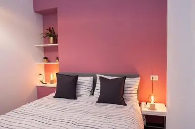 Letto o letti in una camera di San Liborio bed and breakfast