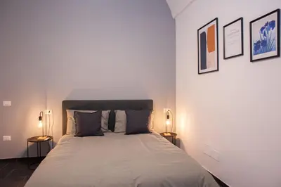 Letto o letti in una camera di San Liborio bed and breakfast