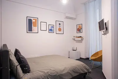 Letto o letti in una camera di San Liborio bed and breakfast