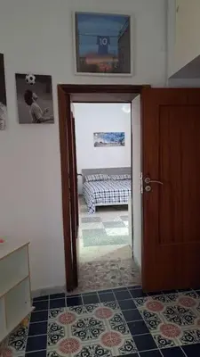 Letto o letti in una camera di Donnaromita holiday house hystoric center