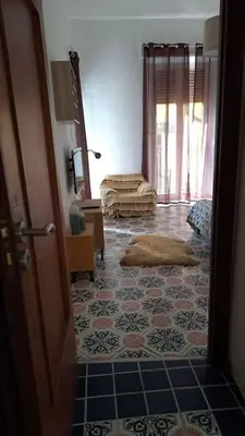 Letto o letti in una camera di Donnaromita holiday house hystoric center