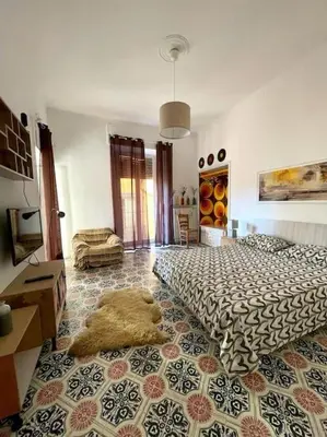 TV o dispositivi per l'intrattenimento presso Donnaromita holiday house hystoric center