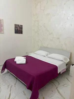 Letto o letti in una camera di Aurora house