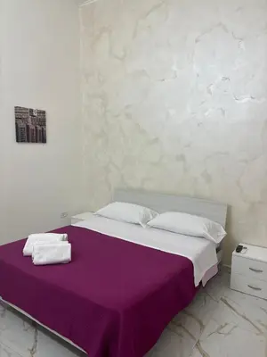 Letto o letti in una camera di Aurora house