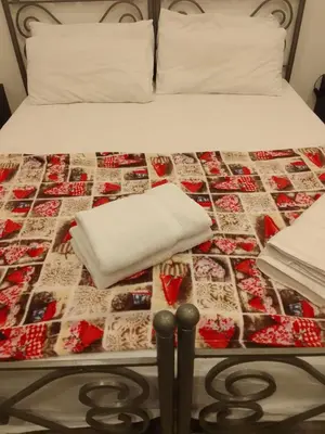 Letto o letti in una camera di Home Passion