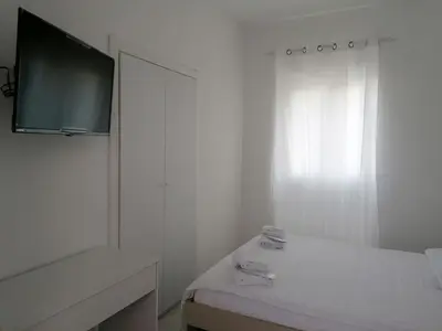 Letto o letti in una camera di Palazzo Sant'Antonio