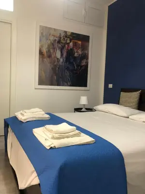 Letto o letti in una camera di Donna Chiara Holiday House - Toledo