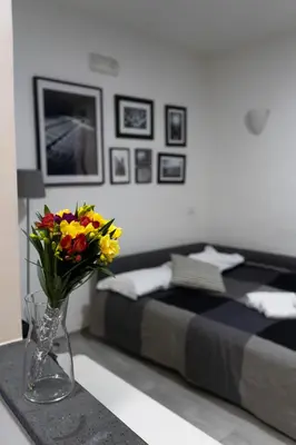Letto o letti in una camera di Donna Chiara Holiday House - Toledo