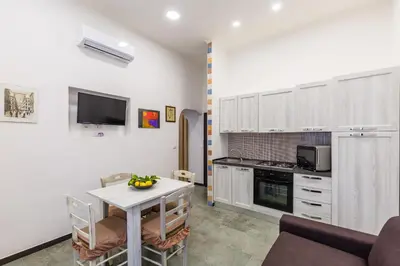 Cucina o angolo cottura di Gelso Complex Studios and Flat by Napoliapartments