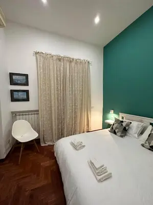Letto o letti in una camera di La stanza di Eleonora