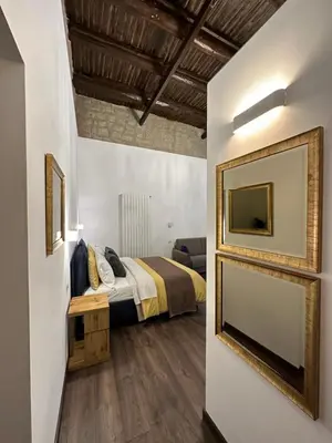 Letto o letti in una camera di LostNaples