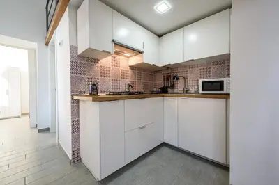 Cucina o angolo cottura di AF Appart'Hotel Napoli