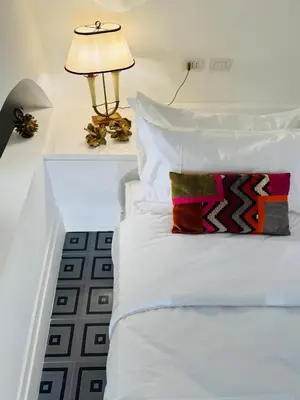 Letto o letti in una camera di Salottino Carafa
