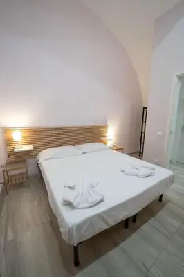Letto o letti in una camera di La Casa di Lucia By Dimorra
