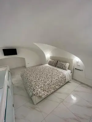 Letto o letti in una camera di Dimora nei Quartieri Spagnoli