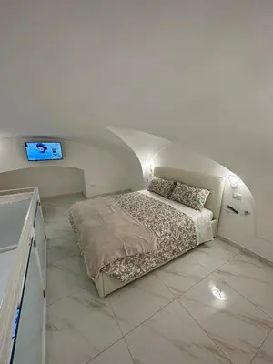 Letto o letti in una camera di Dimora nei Quartieri Spagnoli