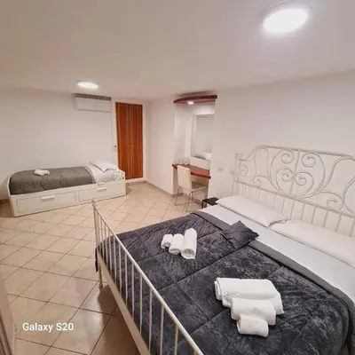 Letto o letti in una camera di Casa Mia al Plebiscito