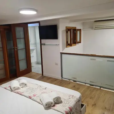 Letto o letti in una camera di Casa Mia al Plebiscito