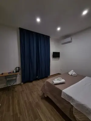 Letto o letti in una camera di Maison Caravita