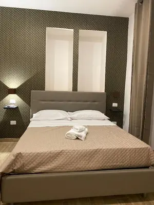 Letto o letti in una camera di Maison Caravita