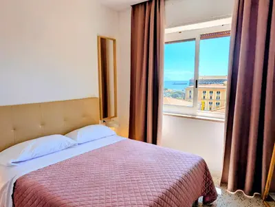 Letto o letti in una camera di ART FLAT MUNICIPIO