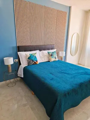 Letto o letti in una camera di ART FLAT MUNICIPIO