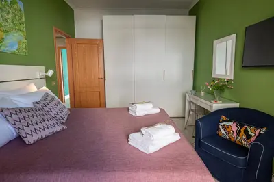 Letto o letti in una camera di Renza House Chiaia