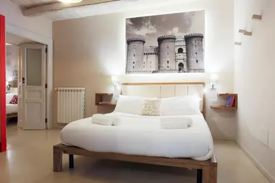 Letto o letti in una camera di Fate Foria Style House